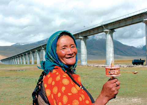 An Old Tibetan Lady welcoming the launch of trains, Tibet Train Travel